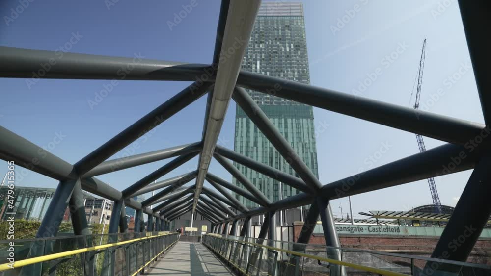 Shot along walk bridge (footbridge) to Deansgate Station, Manchester, Lancashire Shot along walk bridge (footbridge) to Deansgate Station, Manchester, Lancashire