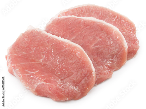 sliced raw pork meat isolated on white background. Clipping path and full depth of field