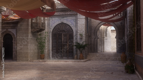 Fotografie, Obraz Empty shaded courtyard in a medieval Arabian city street with patches of sunlight