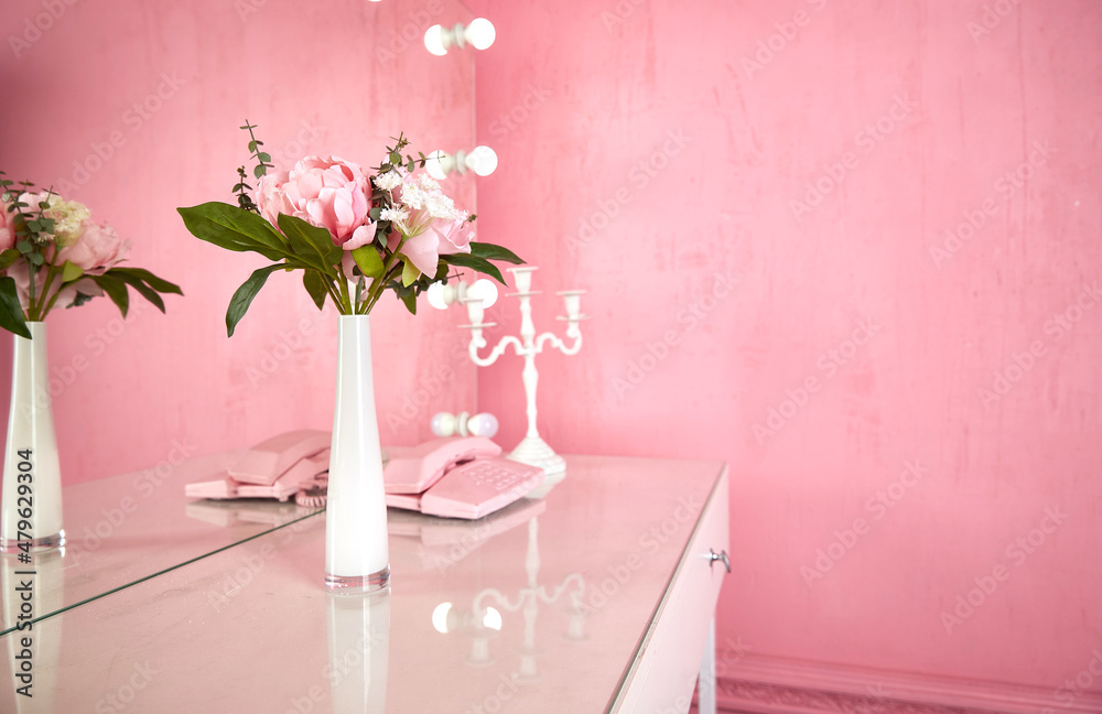 vase on a table in a pink interior. copy space vase on a table in a pink interior. copy space