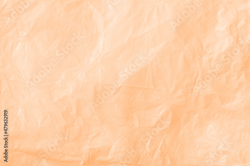 Orange crumpled kraft paper texture