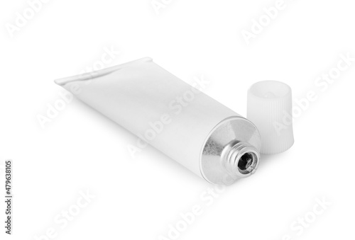 Open tube of ointment isolated on white