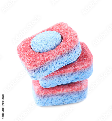 Many dishwasher detergent tablets on white background