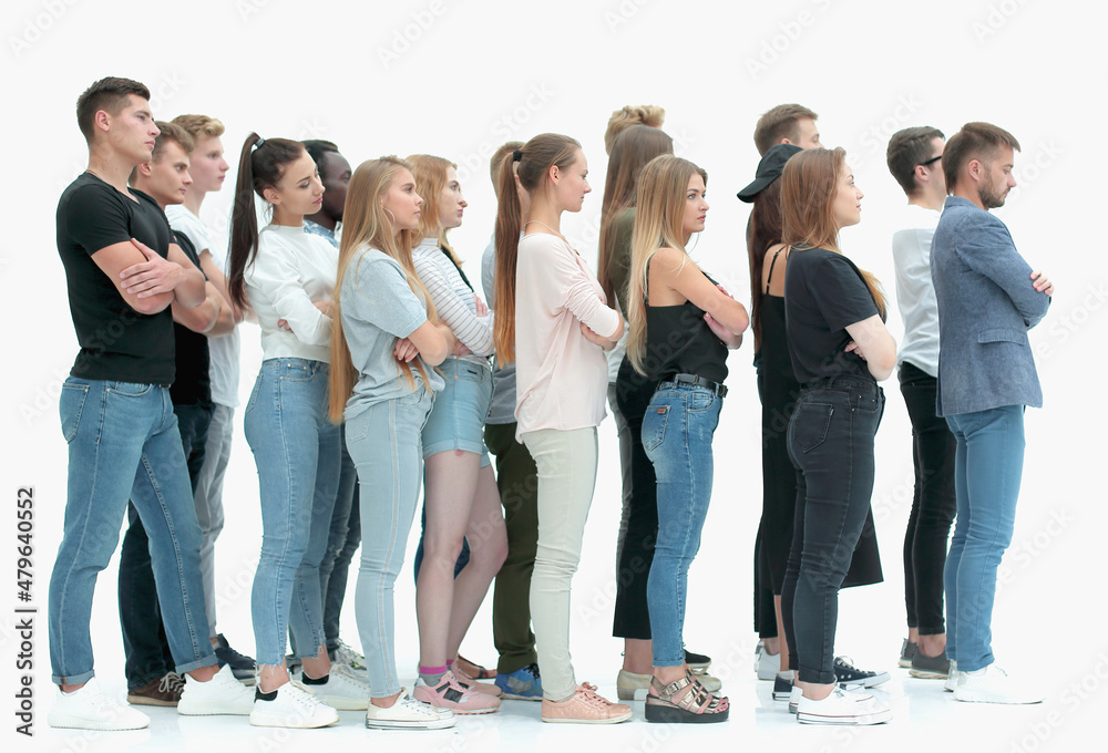 side view. a group of diverse young people standing in a row