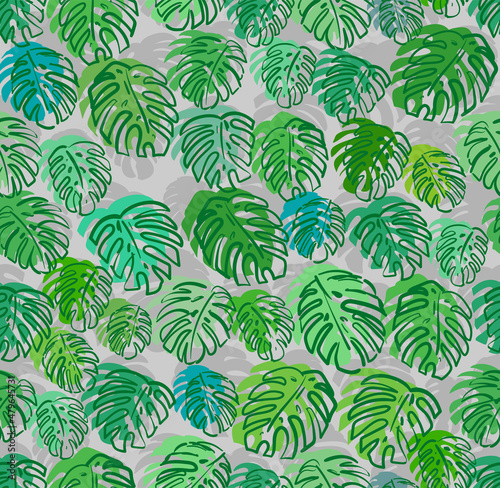 Monstera pattern seamless. Palm leaves background. Tropical texture © popaukropa