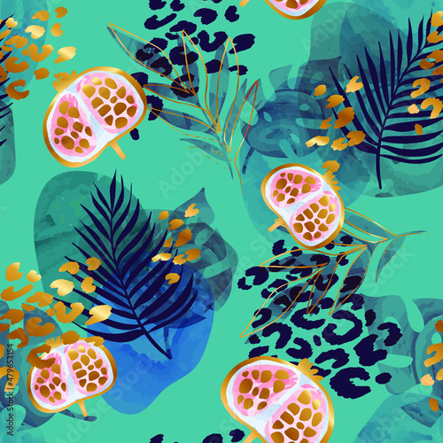 Abstract seamless tropical pattern with pomegranate, leaves, watercolor spots, leopard skim drops. Tropics repeated print for fashion textile, clothes, wrapping paper.