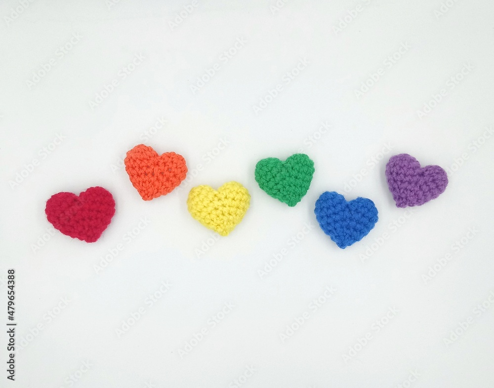 Rainbow colored crochet hearts, lgbt community flag, pride concept Rainbow colored crochet hearts, lgbt community flag, pride concept