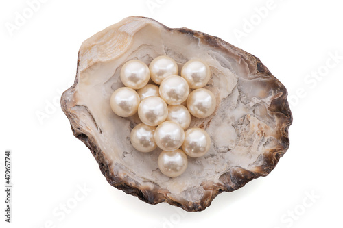 Pearl on shell isolated on white background with clipping path.