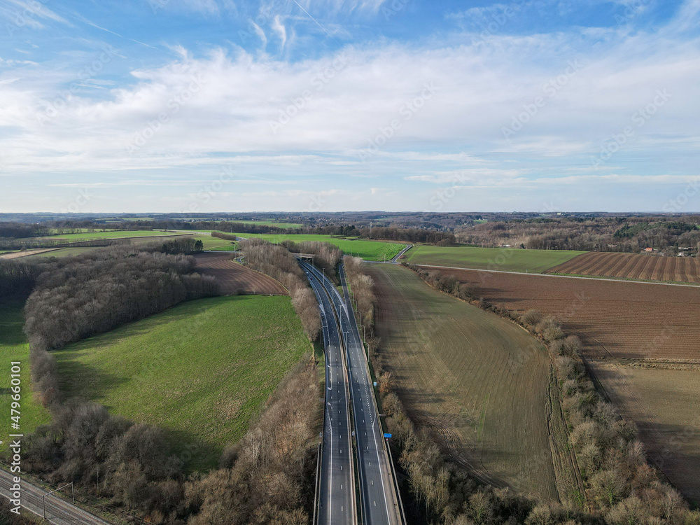 Aerial view of highway during winter season in south of Belgium, Europe Aerial view of highway during winter season in south of Belgium, Europe