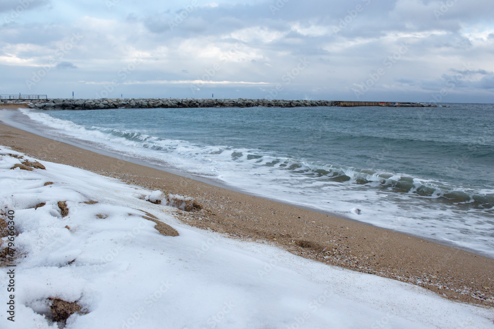 Snow on the beach in Barceloneta, Barcelona
it snowed in Barcelona in 2018
snowy beach