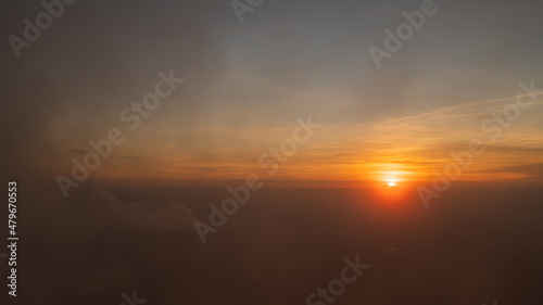Fototapeta Naklejka Na Ścianę i Meble -  Bright orange sky and light of the sunrise.