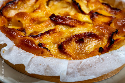 Billede på lærred Baked apple cake with almond frangipani custard close up