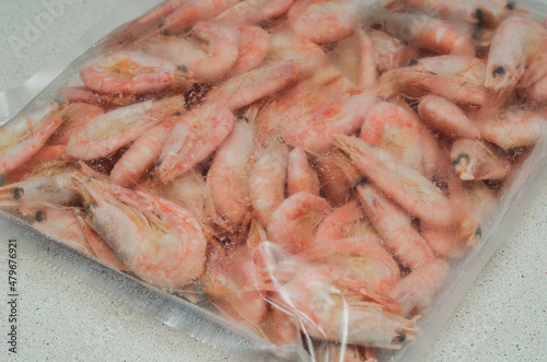 frozen shrimp in plastic packaging