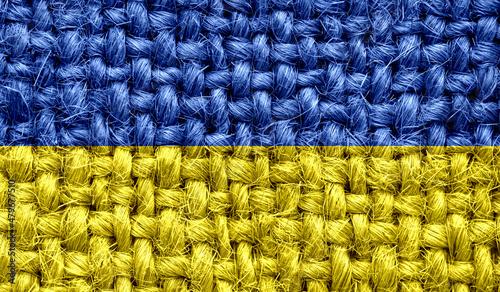 Ukraine flag on fabric texture. 3D image