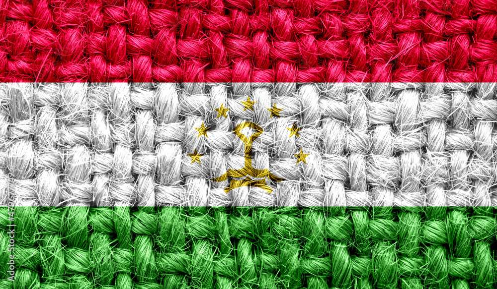 Tajikistan flag on fabric texture. 3D image