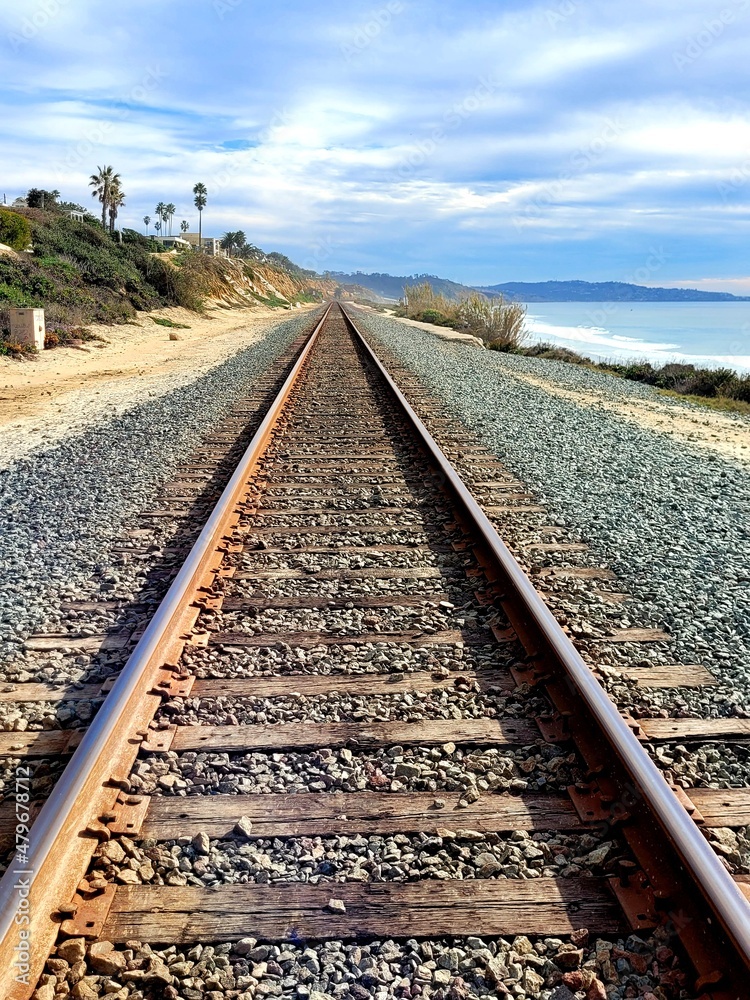 Train rails on the beach