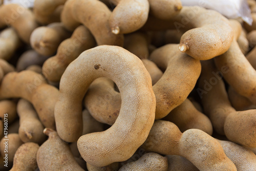 Group of ripe sweet tamarind pods