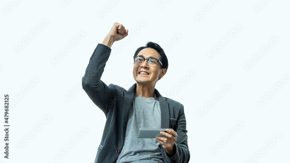 Businessman use smartphones to trade stocks, play games, show joy, show happy, isolated background. Businessman use smartphones to trade stocks, play games, show joy, show happy, isolated background.