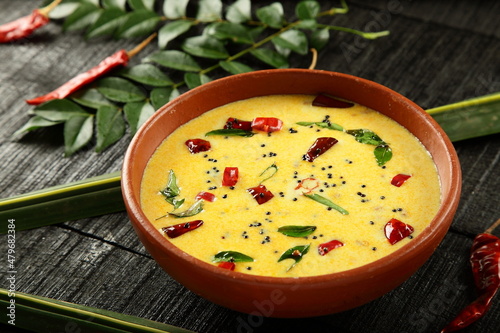 Spiced butter milk - moru curry, moru kachiyathu. Kerala foods. photo