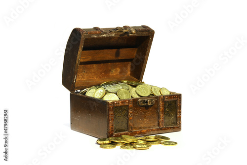 Treasure chest with gold coins over white background