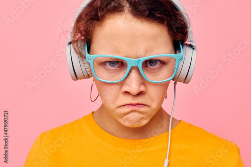 beautiful woman wearing headphones blue glasses close-up emotions Lifestyle unaltered