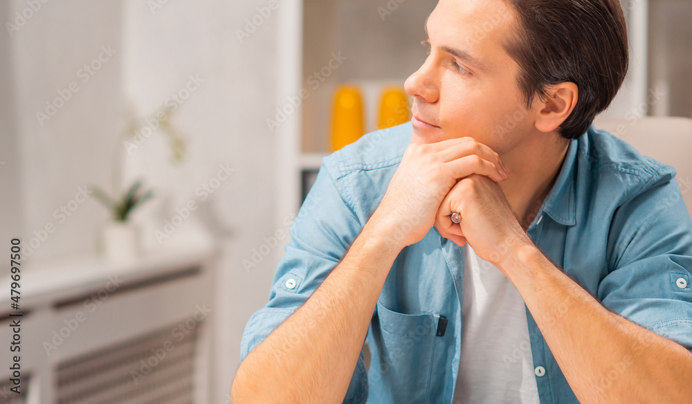 Young man works at home. Freelancer, remote worker or student workplace. Distant work concept. Young man works at home. Freelancer, remote worker or student workplace. Distant work concept.