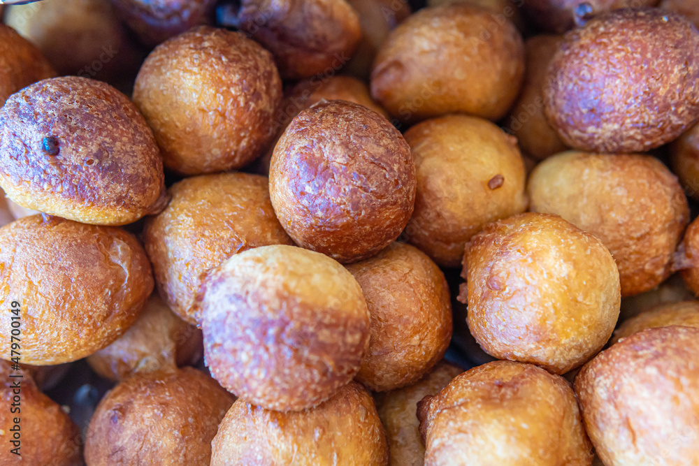 Pile of Nigerian Puff Puff served at party Pile of Nigerian Puff Puff served at party