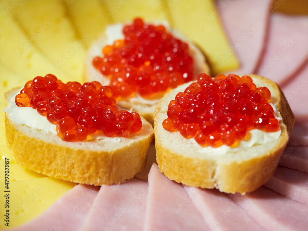 Salmon trout caviar on butter and bread Salmon trout caviar on butter and bread