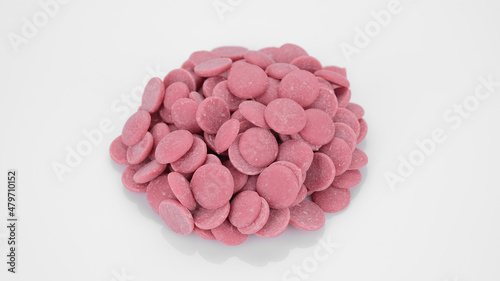Ruby chocolate chips on white background. Confectionery concept