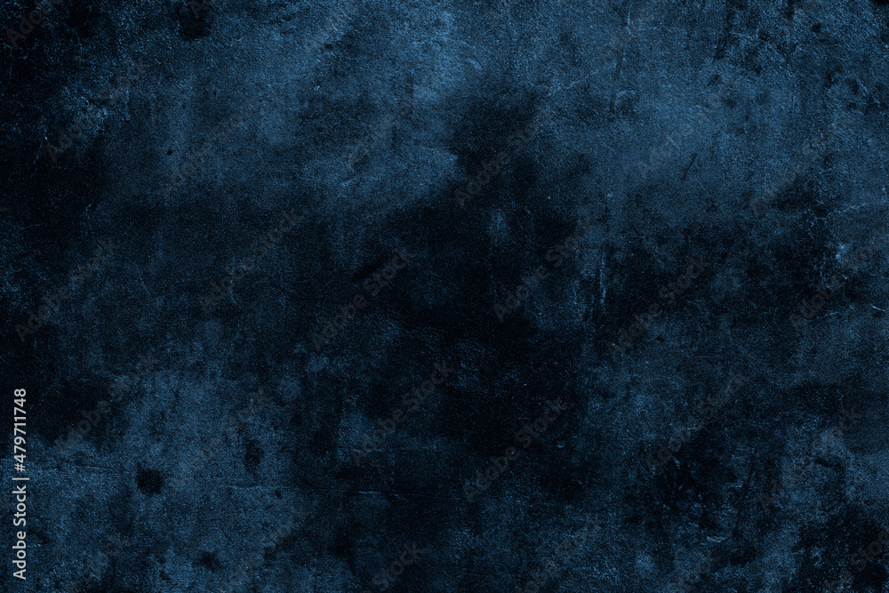 Dark moody blue color old cement plaster wall with spots and grunge textures for background
