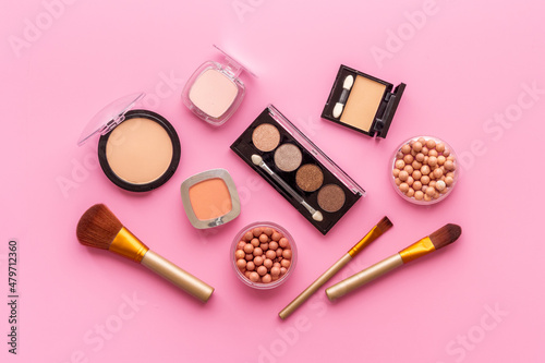 Flat lay of decorative makeup cosmetic products, top view