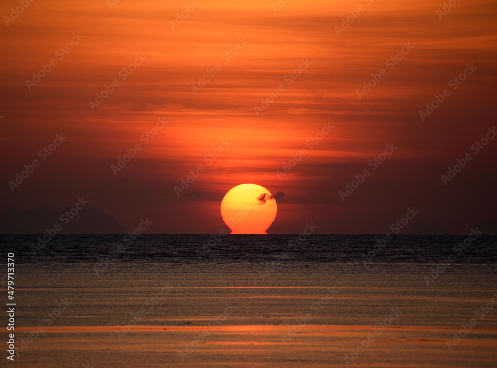 Omega sunrise in the sea at Phuket city Omega sunrise in the sea at Phuket city