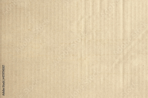 Brown cardboard background. The old paper for recycling. Carton texture. Art and craft concept. Grainy paperboard. Paper Box packaging surface. Simple and minimal backdrop.