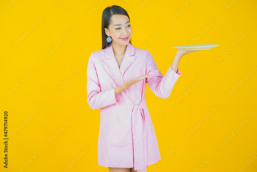Portrait beautiful young asian woman smile with empty plate dish Portrait beautiful young asian woman smile with empty plate dish