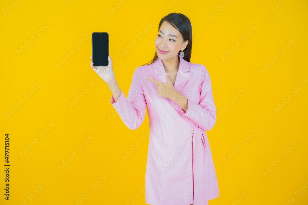 Portrait beautiful young asian woman smile with smart mobile phone Portrait beautiful young asian woman smile with smart mobile phone