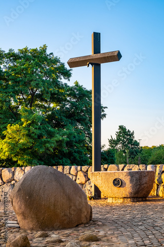 Communist Terror Martyrs memorial by Maciej Szankowski in front of St. Catherine church at Dolina Sluzewiecka street in Ursynow district of Warsaw in Poland photo