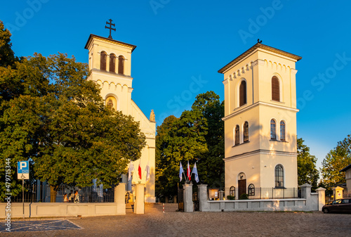 Neo-roman St. Catherine church and bell tower at Dolina Sluzewiecka street in Ursynow district of Warsaw in Poland