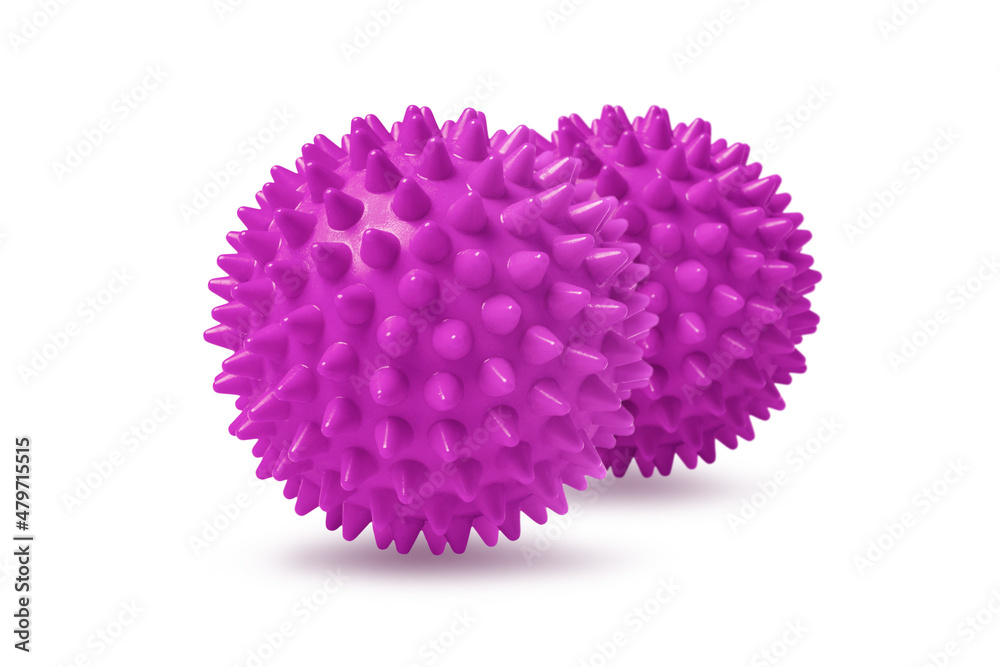 Two pink spiny massage balls isolated on white. Concept of physiotherapy or fitness. Closeup of a colorful rubber ball for dog teeth on a white color background. Corona virus model. Two pink spiny massage balls isolated on white. Concept of physiotherapy or fitness. Closeup of a colorful rubber ball for dog teeth on a white color background. Corona virus model.