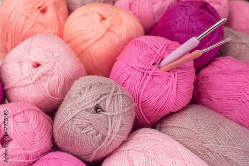 Wallpaper Mural Vintage Knitting needles and yarn on wooden background. natural wool knitting background. knitting yarn for handmade winter clothes. Close Up of yarn balls. Rainbow colors. Place for text, banner. Torontodigital.ca