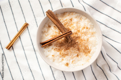 Scandinavian-style rice porridge. white wooden background