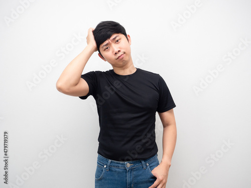Asian man with jeans gesture touch his head © Thanasak