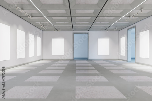 Light concrete gallery interior with empty white mock up posters. 3D Rendering.