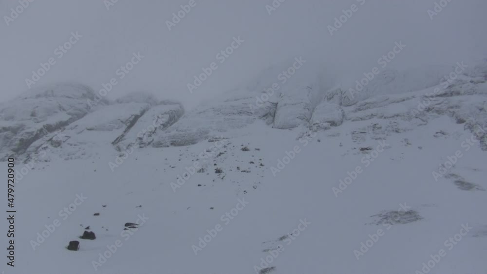 Snow-covered mountain range, snow-covered mountains, winter in the mountains, snowy mountain peaks, snowy sky, winter skies in the mountains, winter holidays, winter travel in the mountains Snow-covered mountain range, snow-covered mountains, winter in the mountains, snowy mountain peaks, snowy sky, winter skies in the mountains, winter holidays, winter travel in the mountains