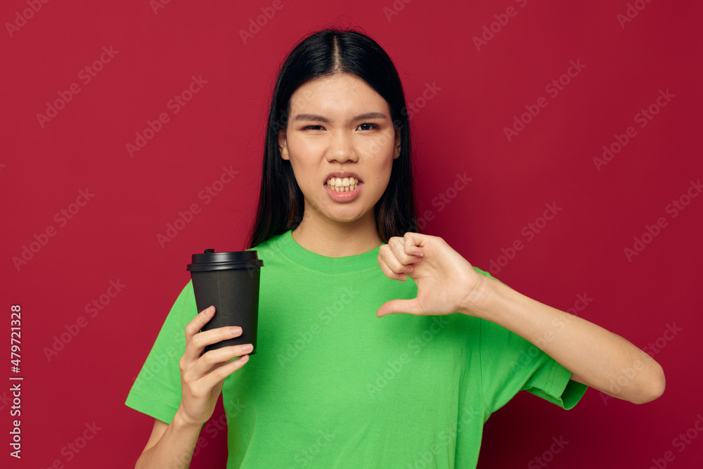 woman in green t-shirt black glass posing woman in green t-shirt black glass posing