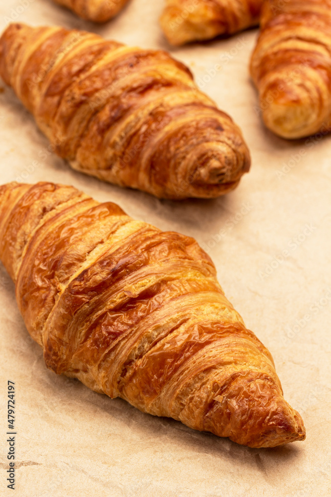 Croissants on paper. Close up.