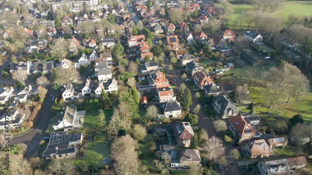 Aerial of large houses in a beautiful and wealthy town Aerial of large houses in a beautiful and wealthy town