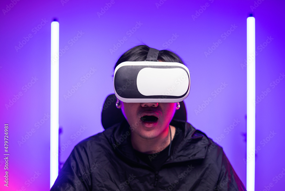 Young man interesting with virtual simulated world. Into the future digital cyber universe. Future technology vr concept. Young man interesting with virtual simulated world. Into the future digital cyber universe. Future technology vr concept.