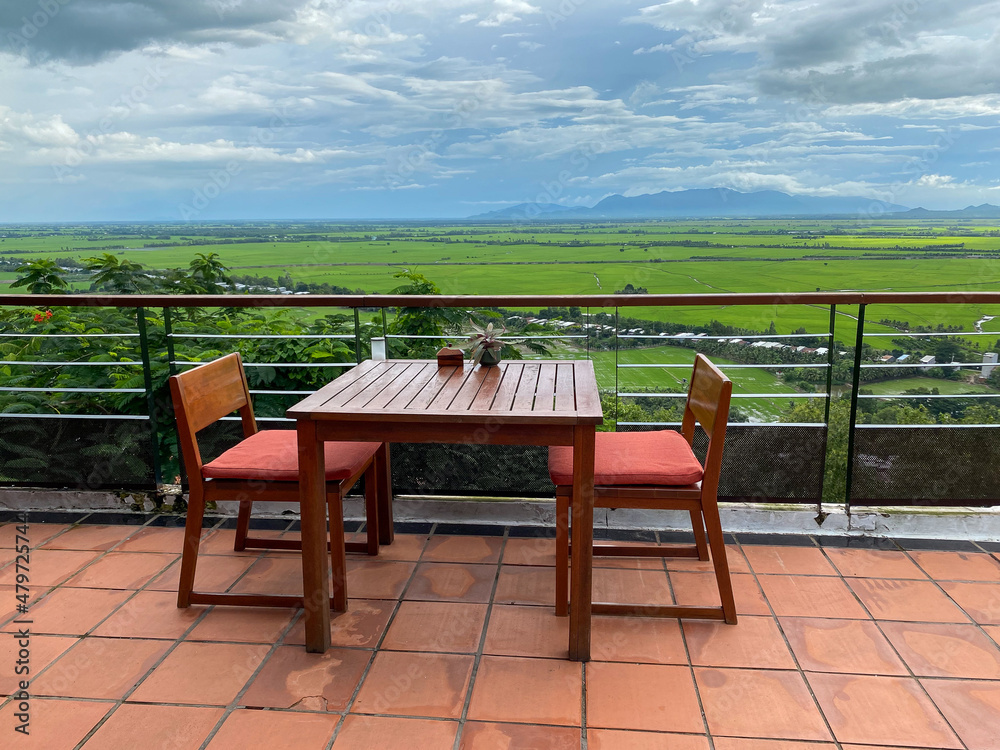 Fototapeta premium Wooden table and chairs at the coffee shop