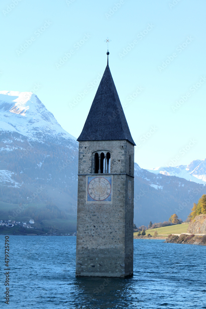 Church under water, drowned village, the lake In South Tyrol (Italy)