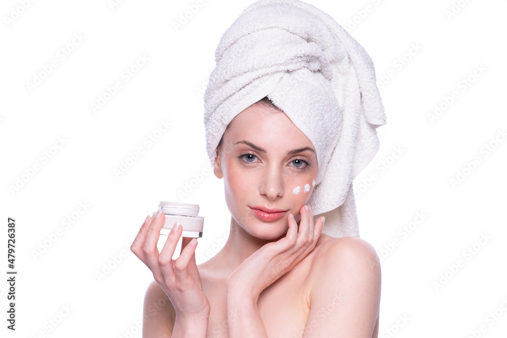 Beautiful attractive blond young woman with clean fresh soft skin applying cream with white background. Beauty care face treatment. Natural studio healthy cosmetic portrait. Cosmetology, beauty, spa. Beautiful attractive blond young woman with clean fresh soft skin applying cream with white background. Beauty care face treatment. Natural studio healthy cosmetic portrait. Cosmetology, beauty, spa.